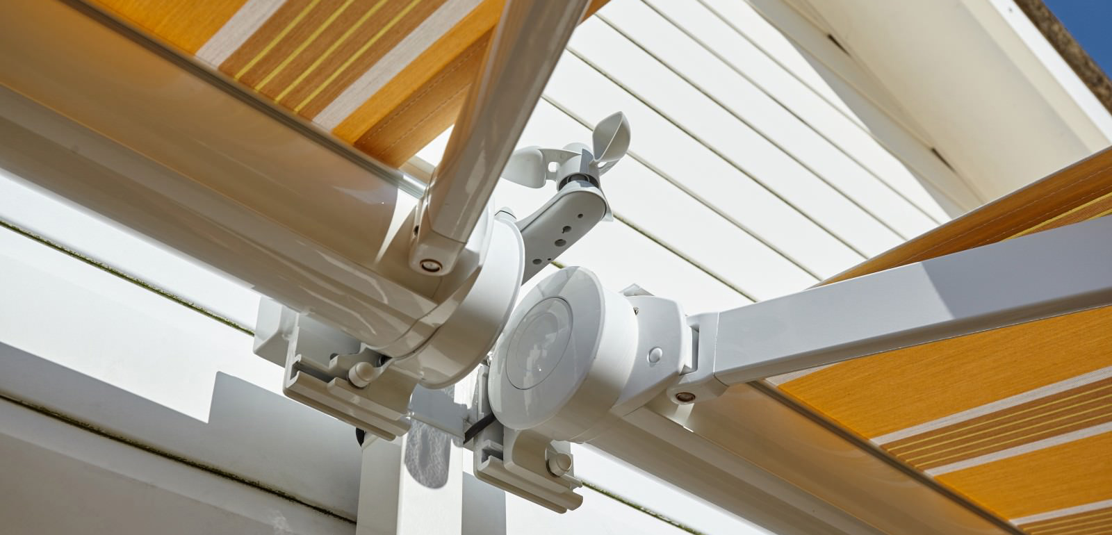 Wind sensor accessory for canopy awnings